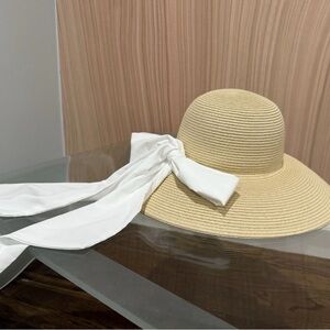 Coolibar Tan Sun Hat with White Bow